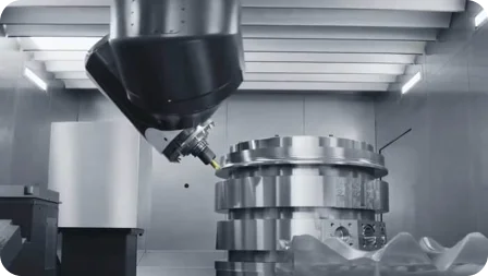 Precision multi-axis CNC machining of a large complex metal cylindrical component