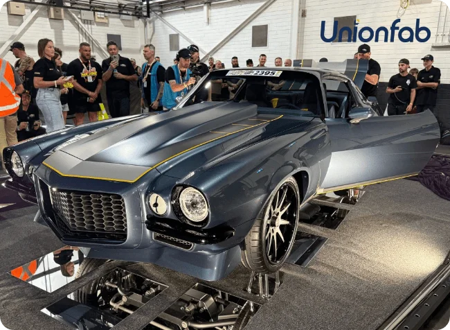 Custom classic car build on display, featuring a precision front grille and exterior components manufactured using Unionfab SLA 3D printing technology.